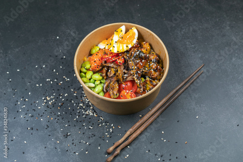 Poke bowl with moshroom, rice, agg and vegetables photo