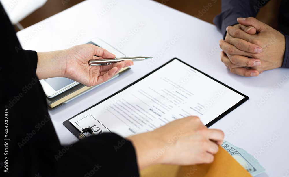 Businessmen give dollars to bribe employees in signing contracts to buy illegal land and real estate, Business fraud and social injustice, corruption and bribery concept. Businessmen give dollars to bribe employees in signing contracts to buy illegal land and real estate, Business fraud and social injustice, corruption and bribery concept.