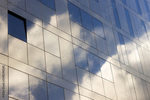 Reflections of the sky on a glassy building