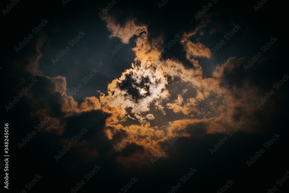 Dramatic sunset covered by clouds beautiful view. Dramatic sunset covered by clouds beautiful view.
