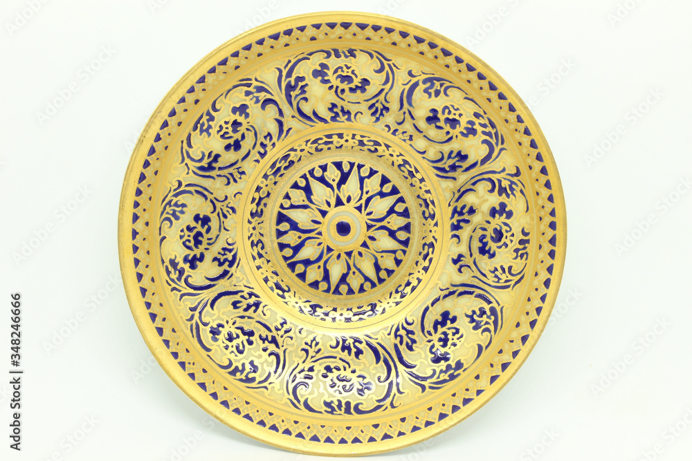 Benjarong Plate on white background, souvenir from Thailand.