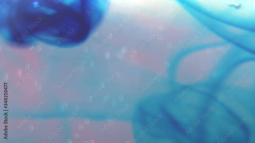 A drop of paint falls and spreads in a liquid. Turbulence. Ink dissolves beautifully in water leaving amazing twists. A drop of paint falls and spreads in a liquid. Turbulence. Ink dissolves beautifully in water leaving amazing twists.