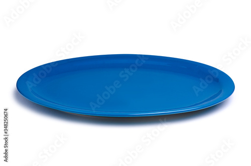 Blue dish plate on a white background isolation