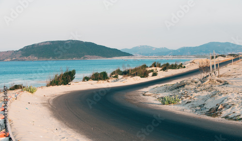 view of the beach and road