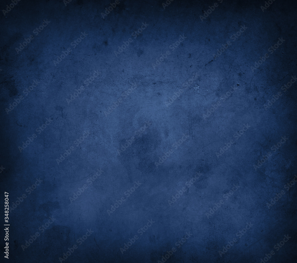 Naklejka premium Blue textured concrete dark wall background