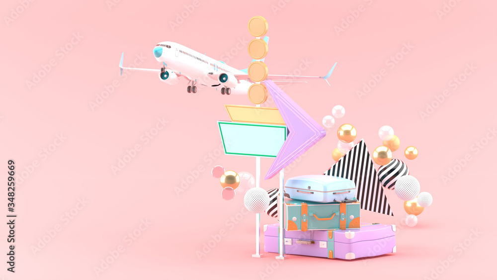 Obraz premium Hotel signs, suitcases and planes amidst colorful balls on a pink background.-3d rendering.