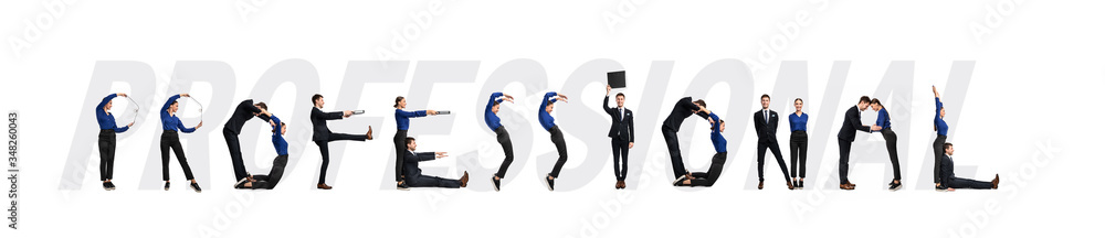 Group of people forming professional word at studio Group of people forming professional word at studio