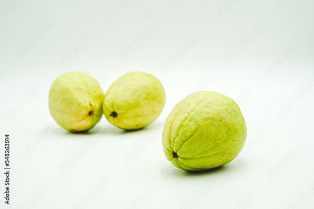 Guava, tropical fruits originated from Malaysia, shot on a white isolated background. Guava, tropical fruits originated from Malaysia, shot on a white isolated background.