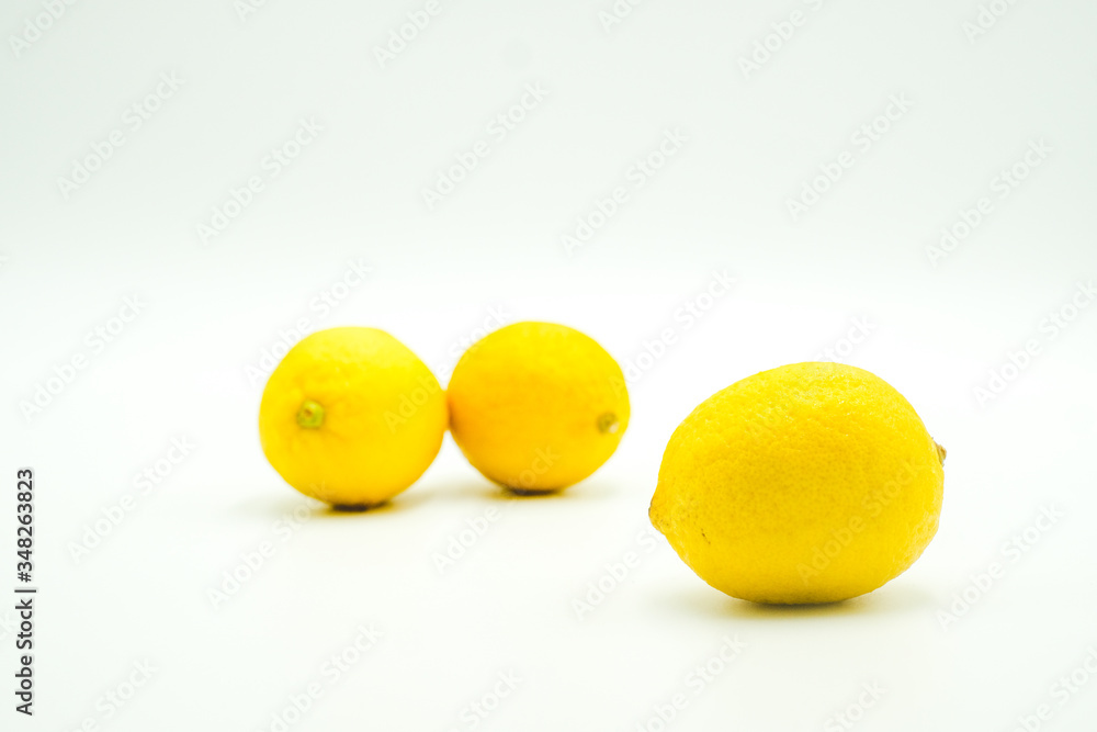 Fresh lemons shot on a white isolated background. Fresh lemons shot on a white isolated background.