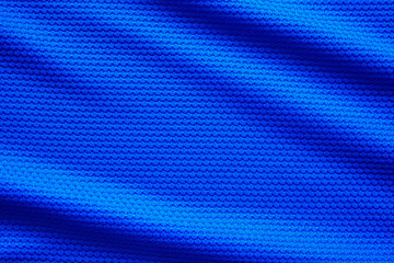 Blue football jersey clothing fabric texture sports wear background, close up top view