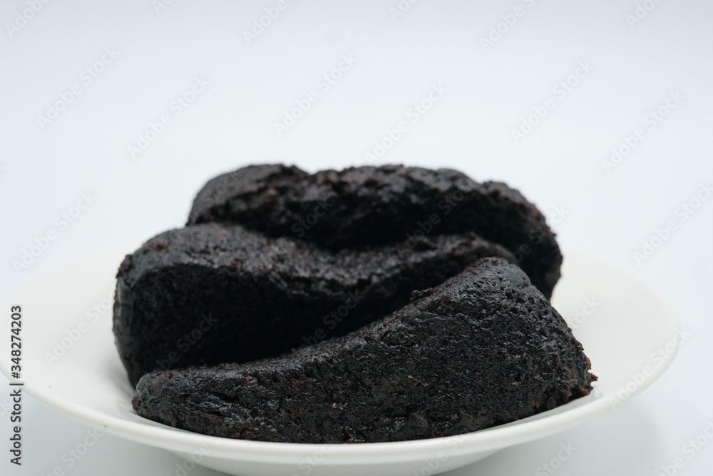 chocolate moist cake shot on a white isolated background. chocolate moist cake shot on a white isolated background.