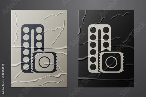 White Packaging of birth control pills and condom in package safe sex icon isolated on crumpled paper background. Contraceptive pill. Paper art style. Vector