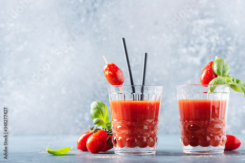 Vegan tomato juice with basil and peppe