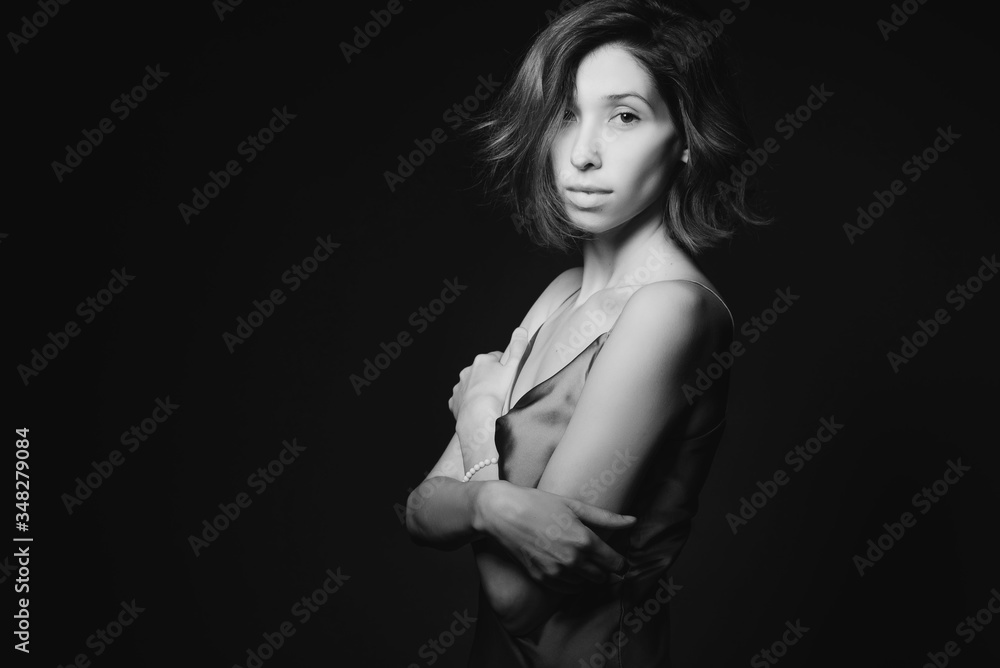Portrait of a beautiful, sexy girl. Black and white art photo. The concept of beauty and youth Portrait of a beautiful, sexy girl. Black and white art photo. The concept of beauty and youth
