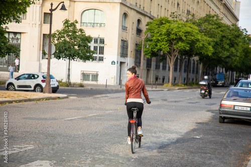 Wallpaper Mural young woman riding a bike Torontodigital.ca