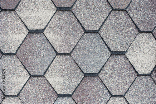 Gray shingles for covering the roof. Building material flexible tile background.