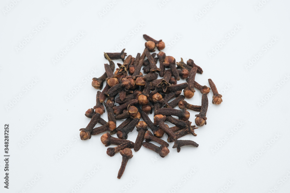 Cloves or Syzygium aromaticum shot on a white isolated background. Cloves or Syzygium aromaticum shot on a white isolated background.