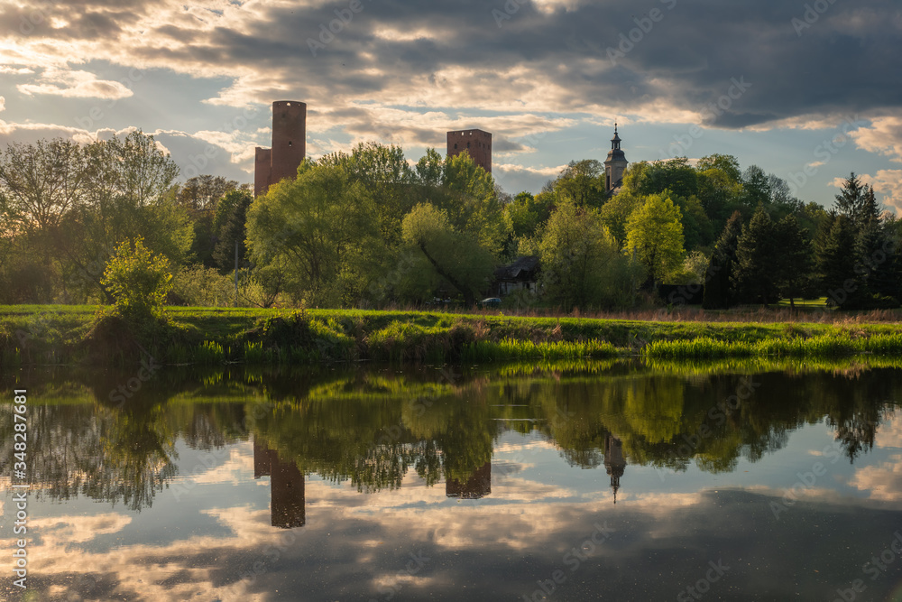 Castle and Czerskie lake at sunset in Czersk, Poland