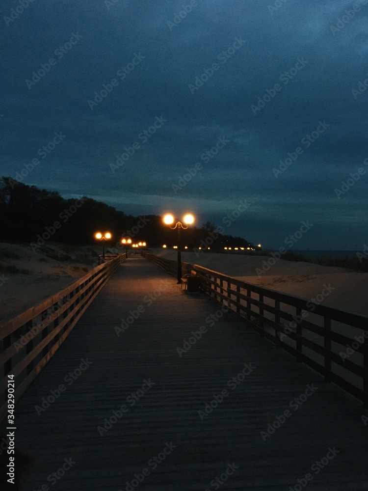 Embankment of the sea in the evening-lit street lamps Embankment of the sea in the evening-lit street lamps