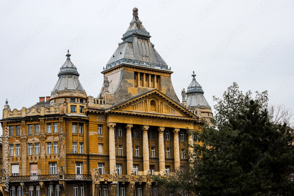 Fototapeta premium Facade of yellow historical building in Deak Ferenc square, Budapest.