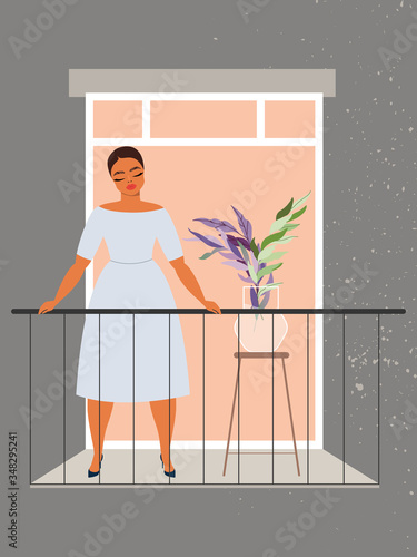 Woman in the window. Beautiful girl standing on the balcony. Quarantine and self-isolation during the pandemic concept. COVID-19 prevention. Single lady with closed eyes standing outside.