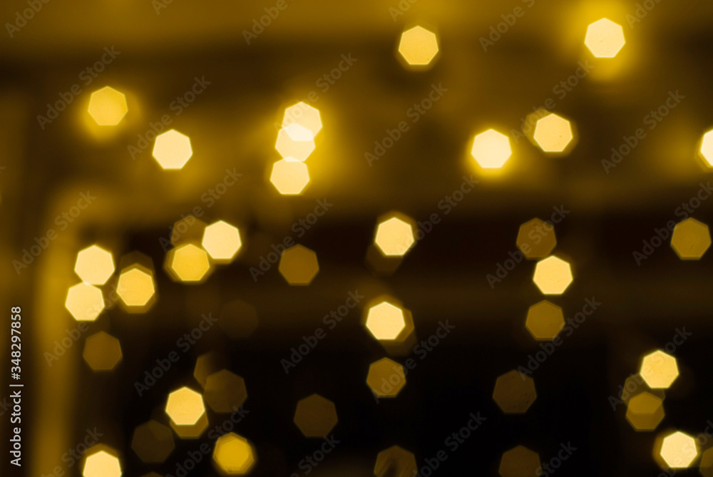 Yellow Christmas Background of round light bulbs With bokeh