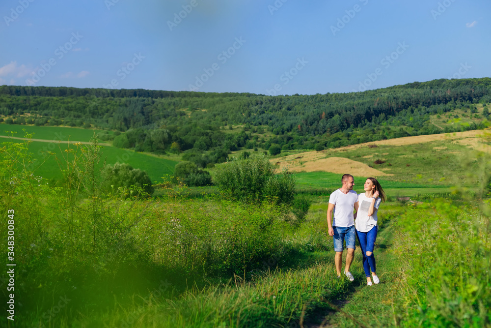 couple in love walking in field
