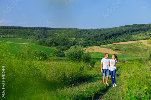 couple in love walking in field