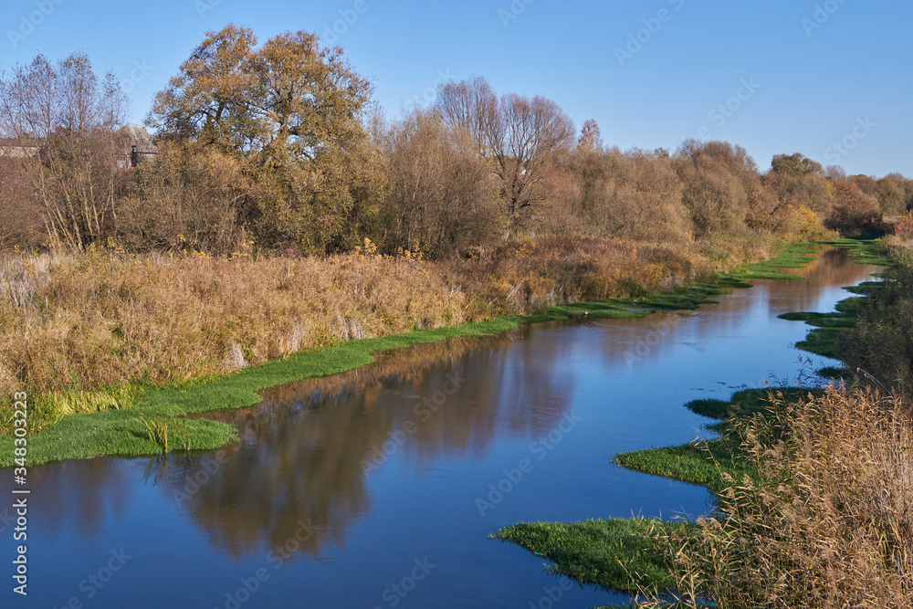 Walk along the bank of the river Snezhet.