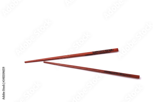 brown wooden chopsticks on the white background