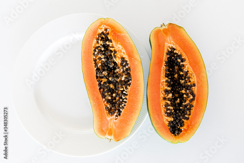 Papaya with mint on the white background