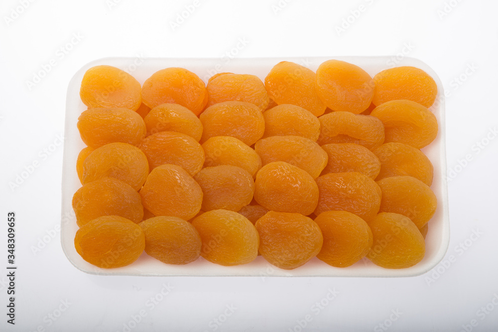 dried apricots on a plate dried apricots on a plate