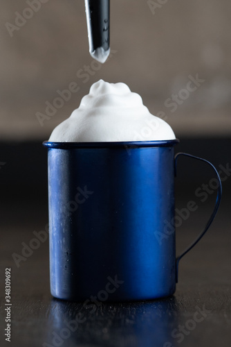 Moscow mule in blue cup with mint 