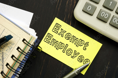 Exempt Employee is shown on the conceptual business photo