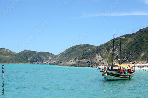 Blue sea in Brazilian tropical paradise, Arraial do Cabo. With boats in the background © Safra