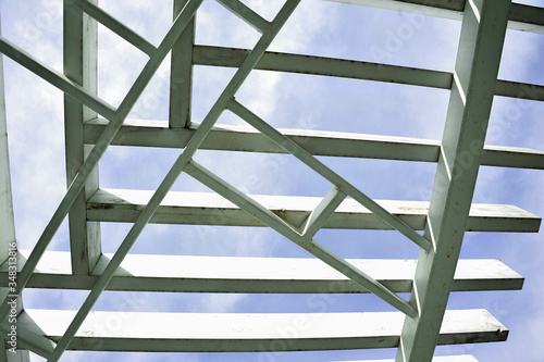 A canopy from polycarbonate arc. Metalware on the blue sky