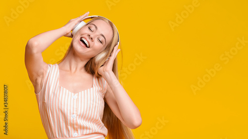 Best Music App. Teen Girl Listening Favorite Song In Wireless Headphones
