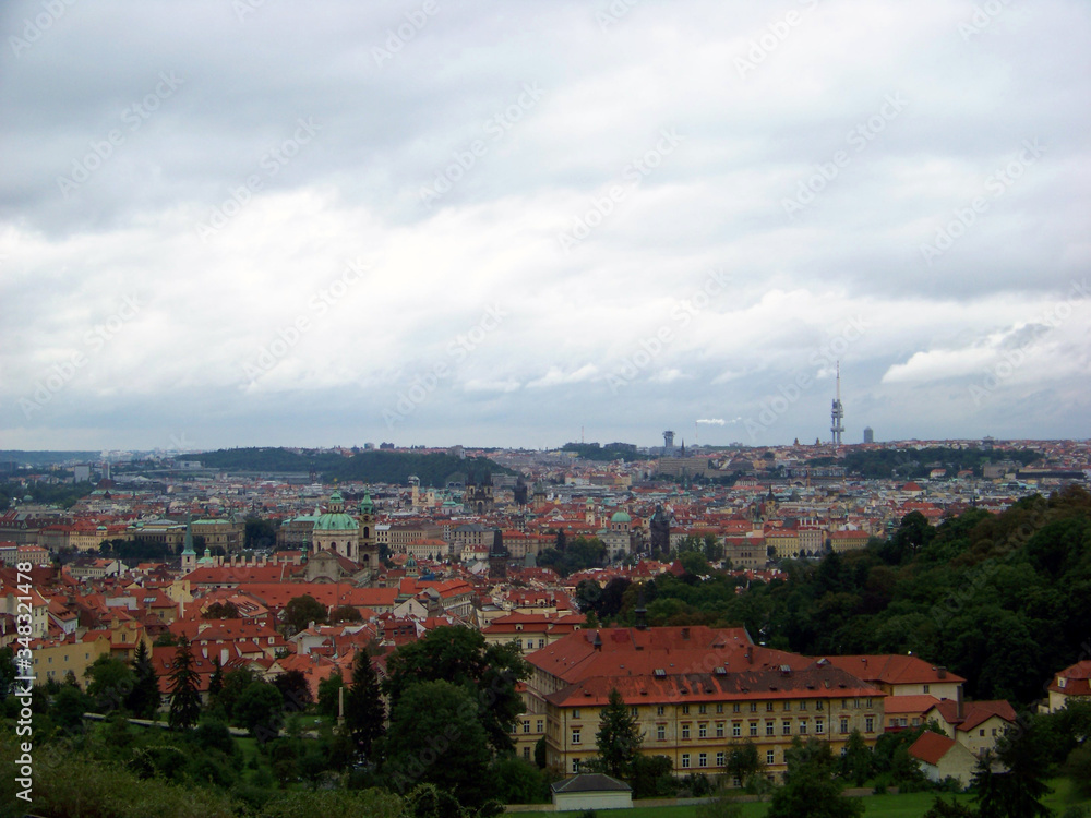 The Prague panorama with many famous city sights, historic architecture, red roof