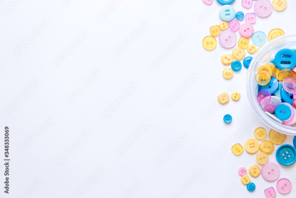 Flat lay with colorful sewing buttons, mock up, top view. Flat lay with colorful sewing buttons, mock up, top view.