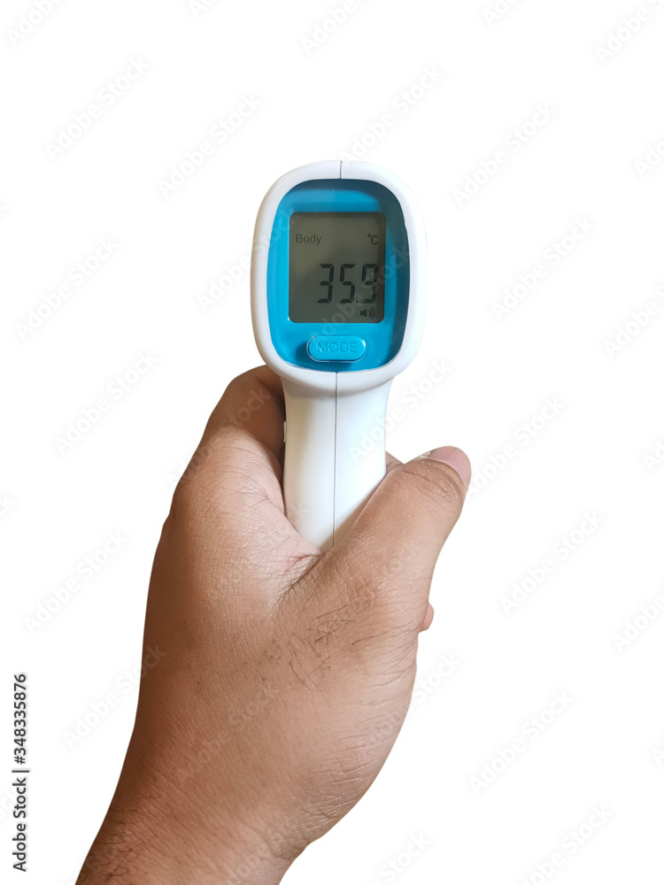 hand holding a thermometer hand holding a thermometer