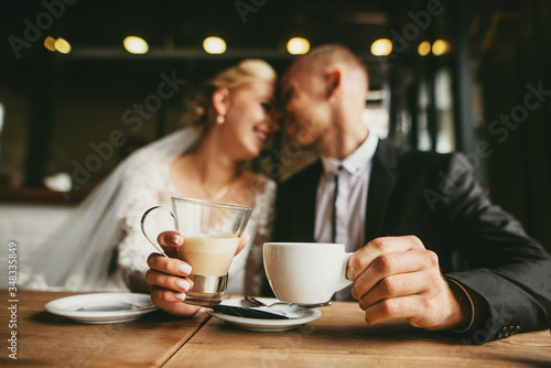 Cups of coffee for bride and groom at wedding day. Selective focus