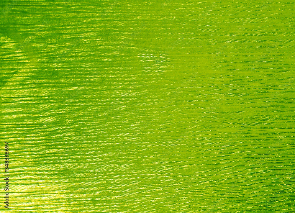 Shiny green leaf gold foil texture background. Glittering background for Christmas holiday, banner, wedding invitation and greeting cards. Shiny green leaf gold foil texture background. Glittering background for Christmas holiday, banner, wedding invitation and greeting cards.