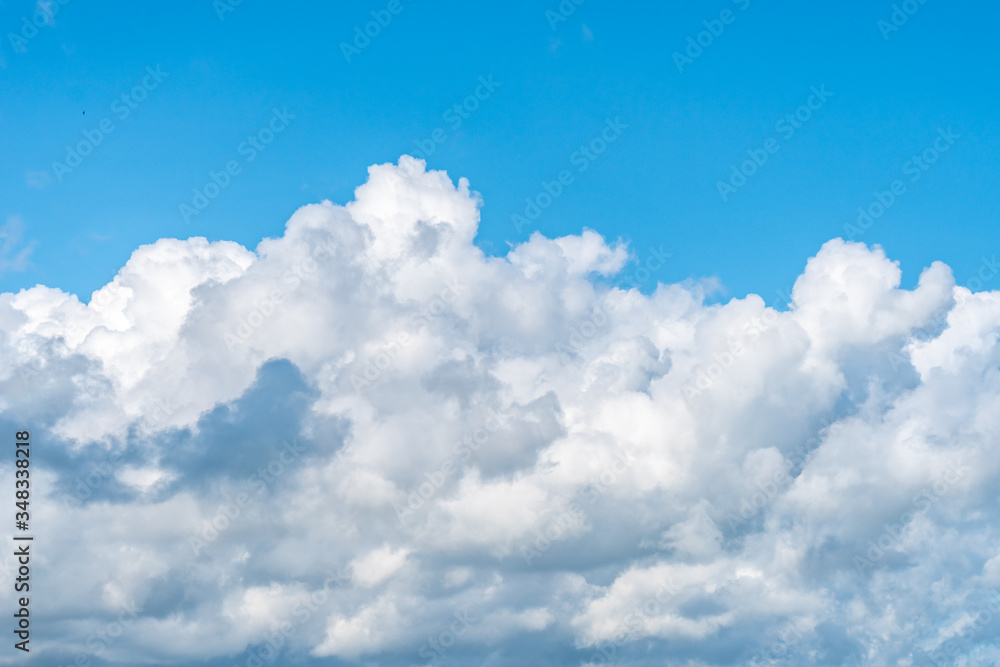 Obraz premium Blue sky background with white clouds, texture