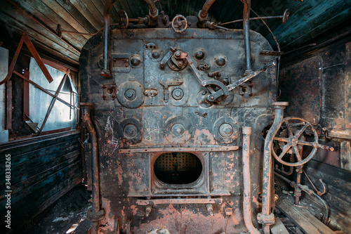 Fototapeta Old steam engine of abandoned steam locomotive Inside driving cabin