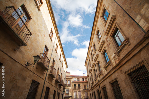 A street in the historic quarter of Salamanca (Spain), an imponent example of the sanstone architecture 