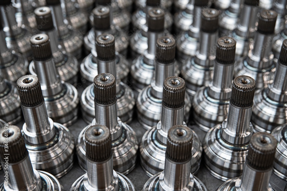 Machine parts. Axles on a factory stack Machine parts. Axles on a factory stack