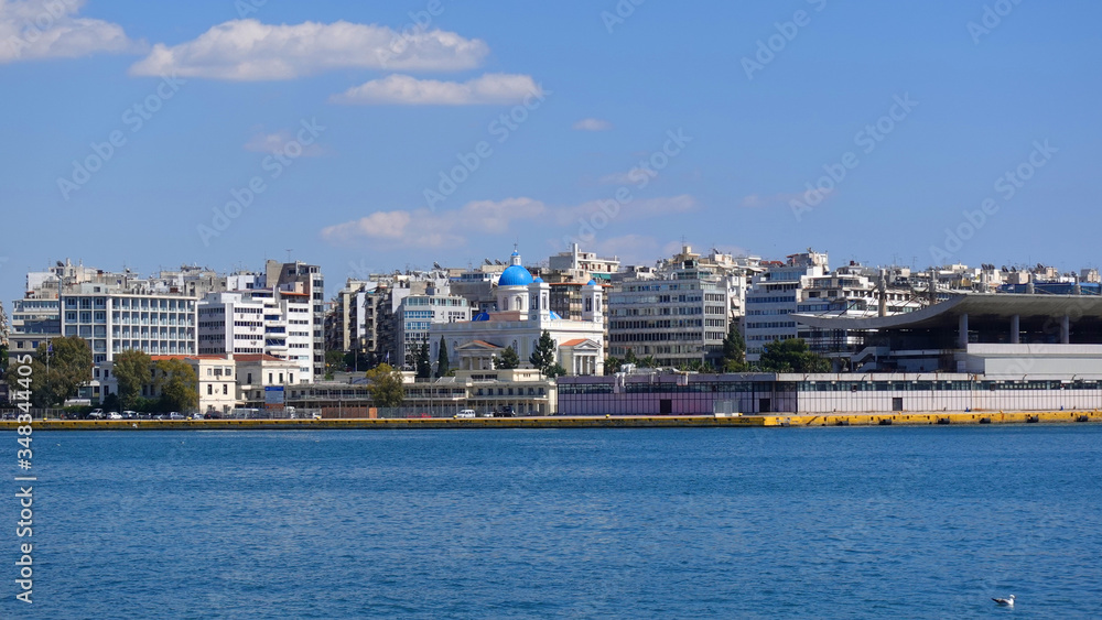 Obraz premium Photo of anchored passenger ferries in busy port of Piraeus on a spring morning, Attica, Greece