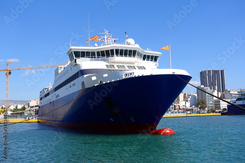Photo of anchored passenger ferries in busy port of Piraeus on a spring morning, Attica, Greece © aerial-drone