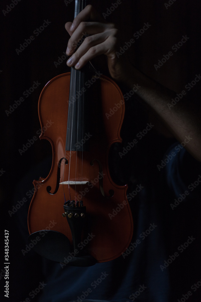 A boy playing violin in quarantine A boy playing violin in quarantine