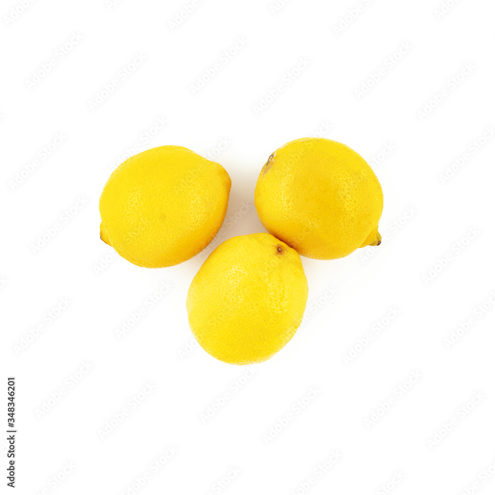 Three lemons isolated on white background. Creative healthy food concept. Top view. Three lemons isolated on white background. Creative healthy food concept. Top view.